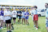 View of children taking part in a summer program to plant mangroves - Merritt Island, Florida