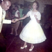Newlyweds dancing at their wedding celebration in Tallahassee.
