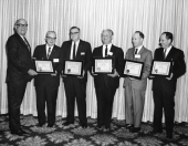 Men receiving certificates of appreciation from the Florida Sheriffs Association.