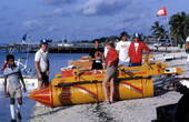First annual Key West Raft Race participants leaving Monroe Beach - Key West, Florida.