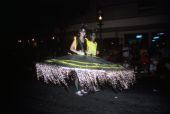 People dressed in costumes on Duval Street during Fantasy Fest 1986 - Key West, Florida.