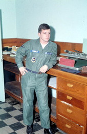 Airman Dale M. McDonald, base photographer, inside base photo lab.