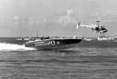 Kiekhaefer Aeromarine III crossing the finish line at Mallory Square - Key West, Florida.