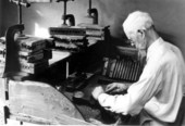 Talmaege Culmer hand rolling a cigar at the Key West Cigar Factory in Pirate's Alley.