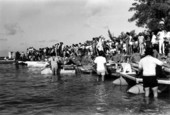 Participants in the 1st Annual Key West Raft Race gather at Monroe Beach, near the West Martello Tower, for the start of the race..
