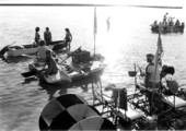 Participants in the 1st Annual Key West Raft Race gather at Monroe Beach, near the West Martello Tower, for the start of the race..