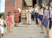 Mayor Dennis Wardlow addresses the crowd as Capt. Alex Vega and Commissioner Carmen Turner look on from the right..