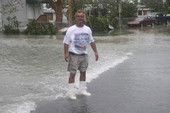 Blain McDonald on Flagler Ave. as storm surge flows across..