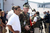 National Guard General Douglas Burnett and FEMA official answer questions from the media..
