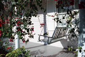 Porch swing at a conch house - Key West, Florida.