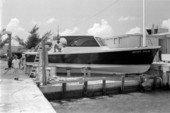 Tony Perez, at left, looks over his brother's boat Moby Dick while under construction at #1 Boat Mfg. on Stock Island.