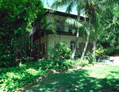 View of the Hemingway house, located on Whitehead street, Key West, FL, from the North side..