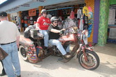 People riding "Deathtrap III" at Boardwalk Chopper and Custom Bike Show - Daytona Beach, Florida.