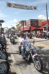 Motorcycles driving down Main Street during Bike Week 2006 - Daytona Beach, Florida.