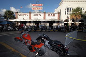 Motorcycles parked in front of Sloppy Joe's Bar during the annual Poker Run - Key West, Florida.