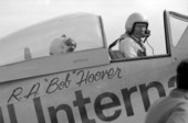 Famed stunt and test pilot R.A. "Bob" Hoover in the cockpit of his P-51 "Mustang" at the Homestead General Aviation Airport during an air show.