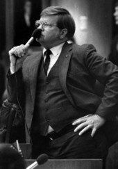 Rep. Bob Johnson, R-Sarasota, rests microphone on his mouth - Tallahassee, Florida.