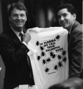 Rep. Frank Messersmith and Rep. Keith Arnold display a novelty t-shirt. - Tallahassee, Florida.