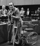 Rep. Gene Hodges with crutches and a wheelchair after a hip injury - Tallahassee, Florida.