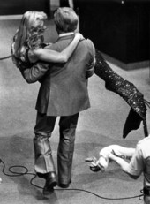 Senator Dempsey Barron tries to walk out with one of Weeki Wachee's mermaids - Tallahassee, Florida.