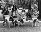 Dughi sisters and other girls hold a "wheelbarrow" race on the front lawn - Tallahassee, Florida.