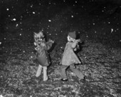 Liz Minerva, left, playing in the snow with Leslie Dughi in Tallahassee, Florida.
