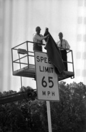 Governor Robert Martinez unveiling the first 65 mph speed limit sign in a ceremony on I-10 just east of Tallahassee, Florida.