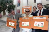 Musician Jimmy Buffett with legislators holding "Save the Manatee" license plates - Tallahassee, Florida.