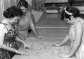 Girls viewing pattern design with instructor at the Florida Industrial School for Girls in Ocala, Florida.