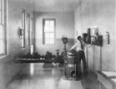 Boy checking waterworks at the School for Boys in Marianna, Florida.