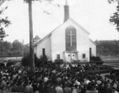 Outdoor church event at the School for Boys in Marianna, Florida.