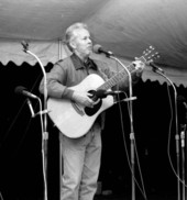Ken Skeens playing guitar at the "Songs Along the Suwannee" concert- White Springs, Florida