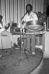 Haitian American man named Lucien playing steel drums at Aux Palmistes restaurant - Miami, Florida