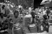 Members from Rasta Samba Gynin playing conga drums during Jamaican Independence Day festival - Miami, Florida.