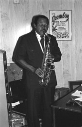 Jazz musician Billy Rolle playing the saxophone in Coconut Grove - Miami, Florida.