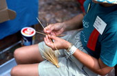 Marcia McCrory weaving some wheat at the Florida Folk Festival - White Springs, Florida