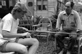Neil Brooks cutting a piece of wood to make a cypress chair as Robert Rudd looks on- Lake Worth, Florida.