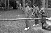 Teenagers participating in a game of horseshoes- White Springs, Florida