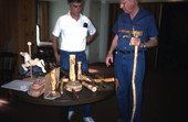 Students at Bobby Johns' cane making workshop looking at wood carvings they made- White Springs, Florida