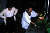 Sumino McGlamory (L) observes as Atsuko Lefcourte makes Ikebana floral arrangement- Lake Park, Florida.