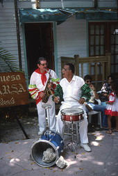 Cuban comparsa band members Hector Borroso (R) and Buddy Chaver performing- Key West, Florida.
