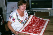 Margaret Horvath showing Transylvanian style Hungarian embroidery she made- Port Orange, Florida