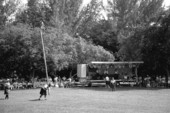 Man participating in "turning the caber" at Key Biscayne Scottish Games- Key Biscayne, Florida