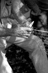 Max Dooley weaving a cast net - Lakeland, Florida.