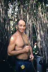 Furniture maker Robert James Rudd holding a piece of cypress - Lake Worth, Florida.