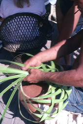 Palm frond hat maker Vic Simmons weaving hat - Boynton Beach, Florida.