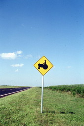 Road sign for tractor crossing on State Road 80 - Belle Glade, Florida.