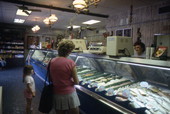 Customers and employee at Pinder's Fish Market - Riviera Beach, Florida.