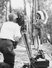 Native American artist Fred Beaver of Ardmore Oklahoma posing for photographer Robert Leahey at the 1961 Florida Folk Festival - White Springs, Florida
