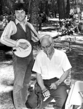 Folk singer Michael Cooney of Lime Rock, Connecticut, left, performing while Jack Bryant works a stick puppet - White Springs, Florida.